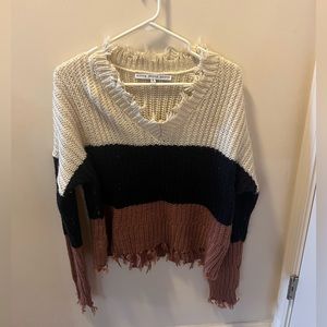 Distressed tri-colored sweater